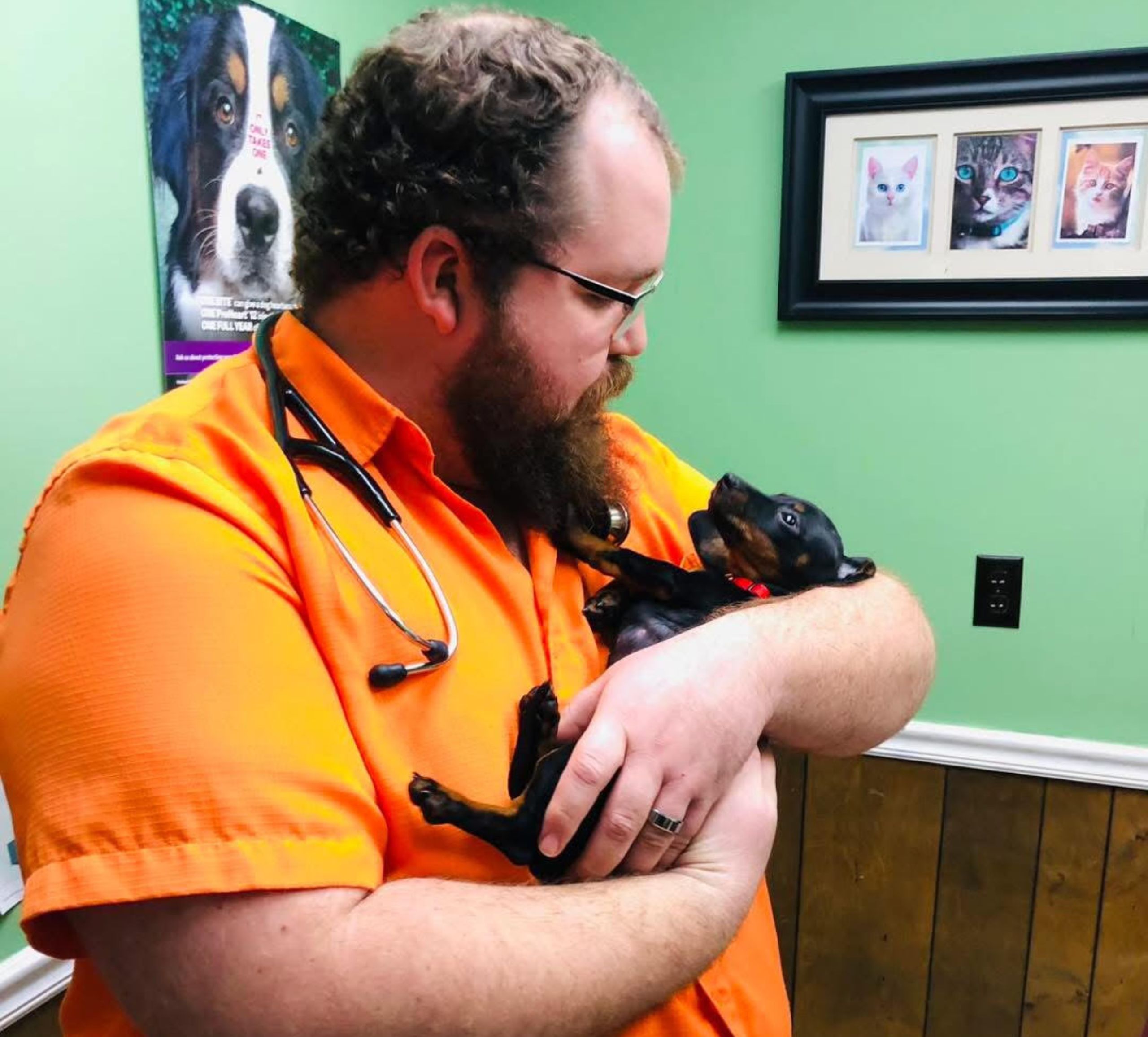 Dr Ragland with Puppy Dr. Ragland holding a puppy